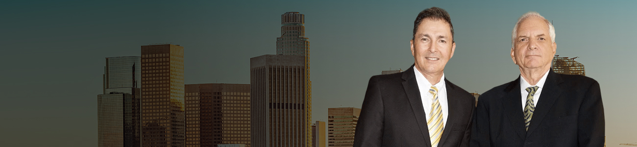 Picture of attorneys with the buildings of Encino, California, in the background