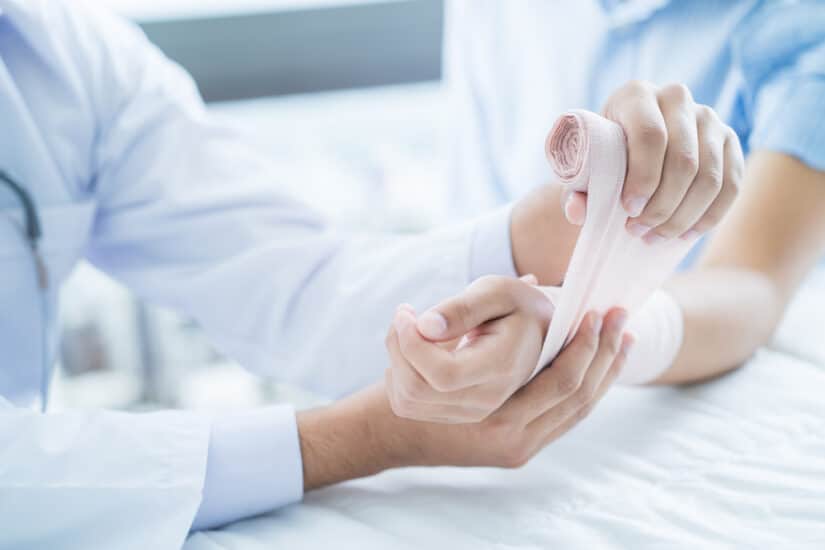 Photo of a patient receiving first-aid treatment